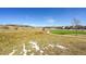 Neighborhood park with soccer field, green grass, and walking paths on a beautiful, sunny day at 3838 Brush Rd, Castle Rock, CO 80108