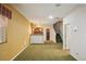 Finished basement features a stylish wet bar and stair access to the upper level at 13075 Tamarac St, Thornton, CO 80602