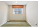 Finished basement with carpet and window provides versatile living space at 13075 Tamarac St, Thornton, CO 80602