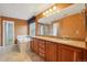 Bathroom boasts double vanity, soaking tub, and separate shower for luxurious experience at 13075 Tamarac St, Thornton, CO 80602