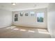 Bright, spacious bedroom with multiple windows offering natural light at 13075 Tamarac St, Thornton, CO 80602