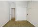 Carpeted bedroom features closet, overhead lighting and access to other rooms at 13075 Tamarac St, Thornton, CO 80602