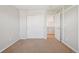 Bedroom features double closet, neutral walls, and easy access to other rooms at 13075 Tamarac St, Thornton, CO 80602