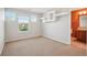 Bright bedroom with three windows and unique shelving providing ample natural light at 13075 Tamarac St, Thornton, CO 80602