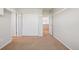 Bedroom with closet and sliding doors, offering storage and access to other areas at 13075 Tamarac St, Thornton, CO 80602