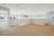 Spacious bonus room provides ample space for recreation and relaxation with three windows at 13075 Tamarac St, Thornton, CO 80602