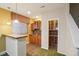 Entertainment wet bar features built-in cabinets, sink, and wine rack at 13075 Tamarac St, Thornton, CO 80602