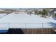 A snowy backyard is enclosed by a chainlink fence, offering a view of open land at 473 N Banner St # C, Elizabeth, CO 80107