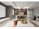 Bar area with seating, beverage cooler, wine storage, and custom cabinetry at 852 Pontiac St, Denver, CO 80220