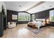 Inviting main bedroom with dark wallpaper, white trim, fireplace, and ample natural light at 852 Pontiac St, Denver, CO 80220