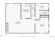 Basement floor plan featuring laundry room, living room, bedroom, storage room and bathroom at 6155 Carr St, Arvada, CO 80004