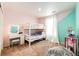 Charming bedroom with bunk bed and stylish decor at 47387 Lilac Ave, Bennett, CO 80102