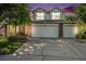 Charming two-story home featuring a three car garage and well-maintained landscaping at 1010 Home Farm Cir, Denver, CO 80234