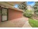 Paved backyard patio with lush landscape at 1160 Johnson St, Lakewood, CO 80215