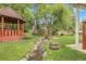 Charming backyard with a quaint gazebo and a peaceful stream at 1160 Johnson St, Lakewood, CO 80215