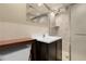 Updated bathroom features a modern vanity and walk-in shower at 1160 Johnson St, Lakewood, CO 80215