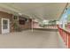 Large covered patio, ideal for outdoor entertaining and relaxation at 1160 Johnson St, Lakewood, CO 80215
