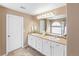 Bathroom with double vanity and updated fixtures at 4686 Longs Ct, Broomfield, CO 80023