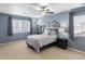 Cozy bedroom with window, ceiling fan and car themed decor at 4686 Longs Ct, Broomfield, CO 80023