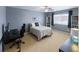 Guest bedroom with desk and built-in shelving at 4686 Longs Ct, Broomfield, CO 80023