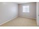 Empty bedroom with neutral tones and ample space at 4686 Longs Ct, Broomfield, CO 80023