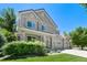 Two-story house with a three-car garage and lush landscaping at 4686 Longs Ct, Broomfield, CO 80023