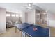 Fun game room featuring ping pong table and seating at 4686 Longs Ct, Broomfield, CO 80023