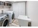 Laundry room with washer, dryer, and utility sink at 4686 Longs Ct, Broomfield, CO 80023