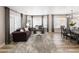 Bright and airy living room with hardwood floors and cozy seating at 4686 Longs Ct, Broomfield, CO 80023