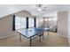 Fun recreation room with ping pong table and seating area at 4686 Longs Ct, Broomfield, CO 80023