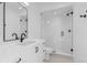 Bright bathroom featuring a vanity and glass enclosed shower at 2010 S Clarkson St, Denver, CO 80210