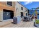 Outdoor patio with a dining set and views of the surrounding neighborhood at 3377 Blake St # 205, Denver, CO 80205