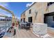 Charming rooftop deck with metal railing and comfortable seating featuring views of the surrounding city at 3377 Blake St # 205, Denver, CO 80205
