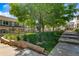 Well-maintained community with green spaces, sidewalks, and attractive residential buildings at 1918 Depew St, Lakewood, CO 80214