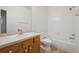 Bathroom featuring a single sink vanity, a large mirror, and a bathtub at 11391 Navajo Cir # B, Westminster, CO 80234