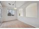 Bright bedroom featuring a large window, neutral walls, and plush carpeting at 11391 Navajo Cir # B, Westminster, CO 80234
