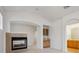 Cozy living room with fireplace, wet bar, and adjacent bathroom at 11391 Navajo Cir # B, Westminster, CO 80234