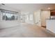 Expansive living room offering generous natural light and neutral carpeting at 11391 Navajo Cir # B, Westminster, CO 80234