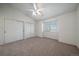 Bright and airy bedroom with neutral carpet and closet at 10381 Cook Way # 202, Thornton, CO 80229