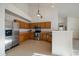 Updated kitchen with stainless steel appliances, modern cabinetry, and great natural light at 10381 Cook Way # 202, Thornton, CO 80229