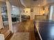 Basement featuring a ping pong table and a large sectional couch at 8757 W 75Th Way, Arvada, CO 80005
