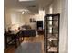Basement rec room with desk, sofa and shelving at 8757 W 75Th Way, Arvada, CO 80005