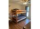 Bedroom with a bunk bed and hardwood floors at 8757 W 75Th Way, Arvada, CO 80005