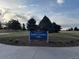 Community Robby Ferrufino Park featuring lush green grass and mature trees at 8757 W 75Th Way, Arvada, CO 80005