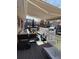 Spacious outdoor patio with multiple seating areas and a barbecue at 8757 W 75Th Way, Arvada, CO 80005