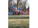 Community playground with vibrant colors, slides and climbing equipment at 8757 W 75Th Way, Arvada, CO 80005