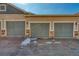Three-car garage providing ample parking and storage at 494 Black Feather Loop # 117, Castle Rock, CO 80104