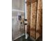 Close-up of basement equipment featuring plumbing and water regulator at 221 Homestead Pkwy, Longmont, CO 80504