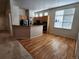 Open floor plan with a kitchen featuring oak cabinets, stainless appliances, and ample counter space at 221 Homestead Pkwy, Longmont, CO 80504