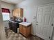 A convenient laundry room equipped with modern washer, dryer, and utility sink at 221 Homestead Pkwy, Longmont, CO 80504